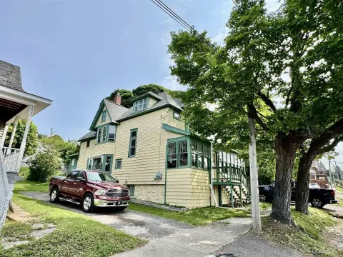 Well-Maintained Duplex with Enclosed Porch