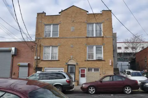 Brick Three-Family Development Site