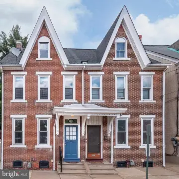 Brick Twin Home with Sunroom