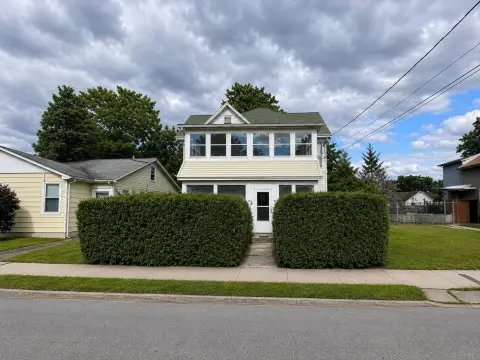 Two-Family Home with Enclosed Porches