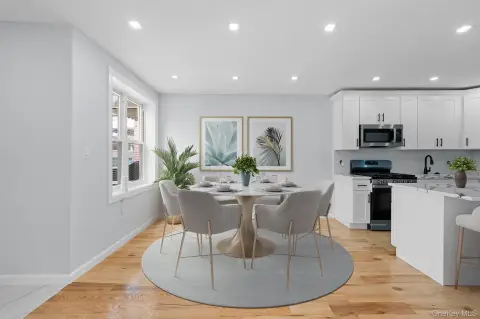 Renovated Two-Family Brick Residence