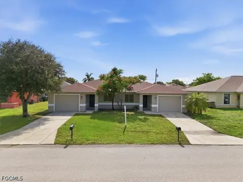 Well-Maintained Duplex with Garages