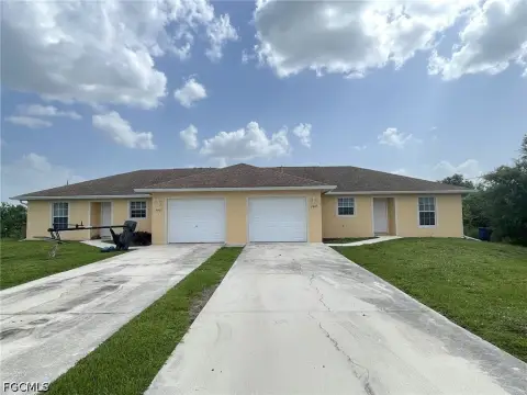 Well-Maintained Duplex With Garages