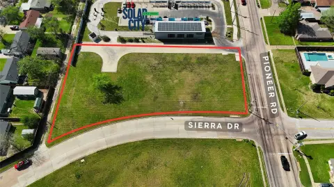 Hard Corner Commercial Lot with Screening Wall