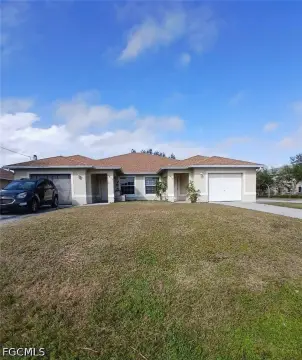 Corner-Lot Duplex With Updated Systems