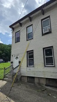 Two-Unit Duplex with Renovated Upper Level