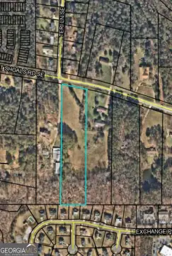 Fenced Commercial Land Lot