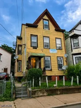 Detached Triplex with Private Backyard