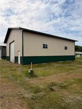 Storage Building with Overhead Door