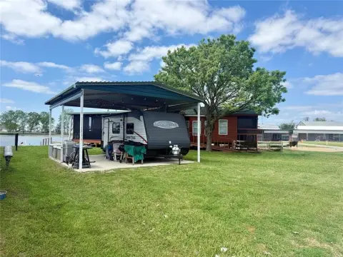 Waterfront Lot with RV Included