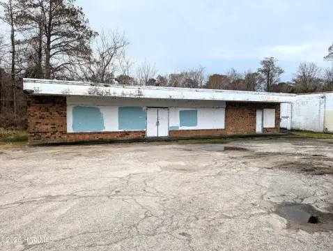 Commercial Land with Existing Building