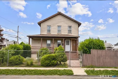 Two-Family Home with Adjacent Lot