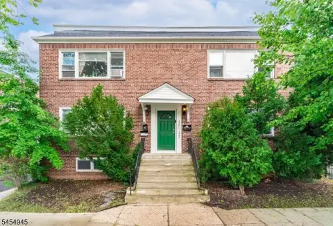 Brick Triplex with Three-Car Garage