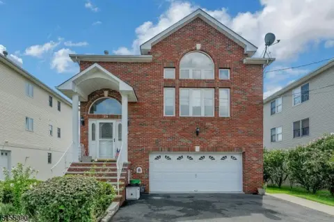Two-Unit Duplex with Owner's Suite