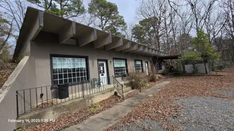 Concrete Building on Acre Lot