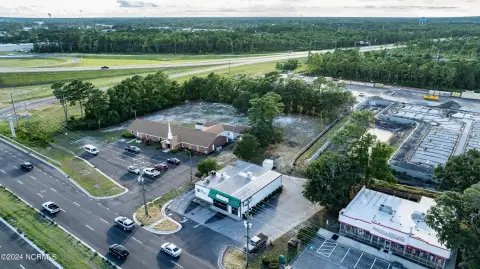 Commercial Land with Existing Building