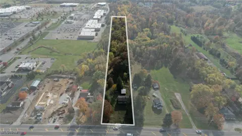 Commercial Land with Existing House