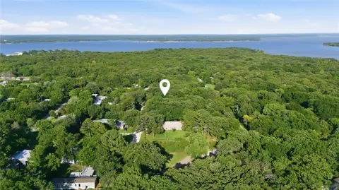 Wooded Waterfront Land Lot