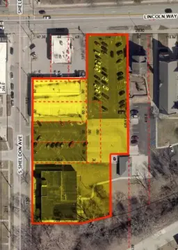 Commercial Land with Existing Buildings