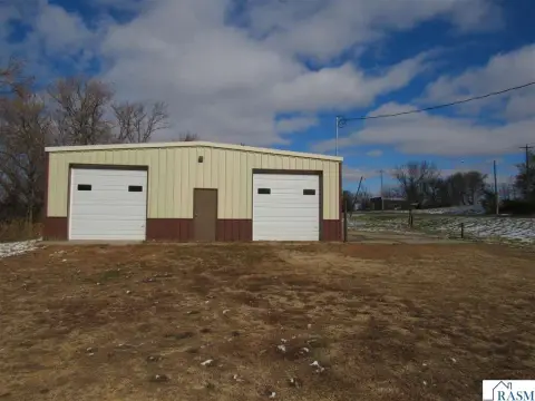 Metal Shed on Highway Lot