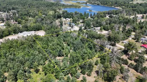 Wooded Land Parcel with Cleared Site