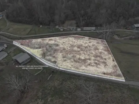 Flat Buildable Acreage with Creek Frontage