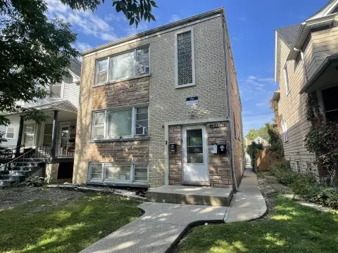 Brick Multifamily Building with Garage