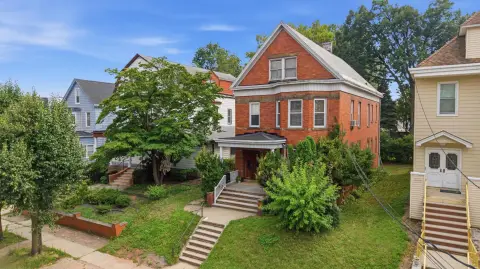 Brick Duplex With Slate Roof