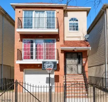 Two-Story Duplex with Attached Garage
