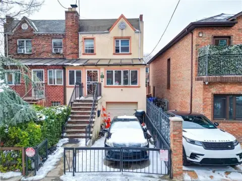 Two-Family Brick Residence with Garage