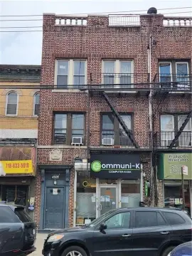 Brick Mixed-Use Income Building