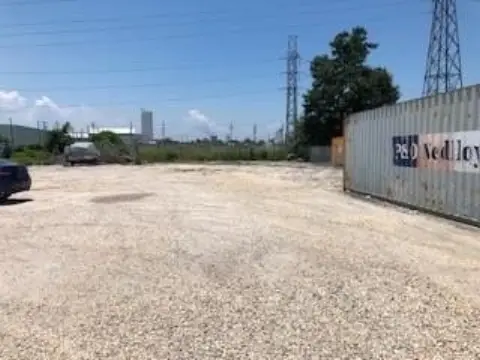 Gravel Parking Lot with Enclosure