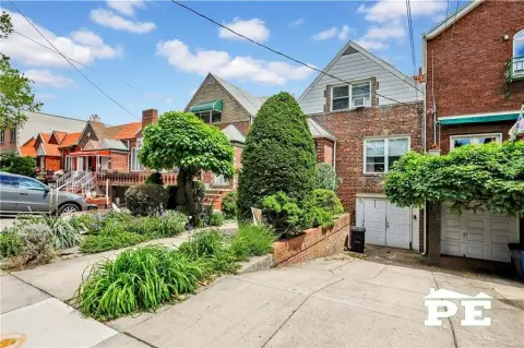 Two-Family Brick Home with Roof Terrace
