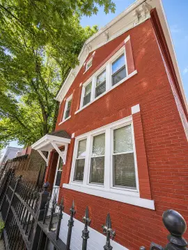 Brick Multifamily with Garden-Level Unit