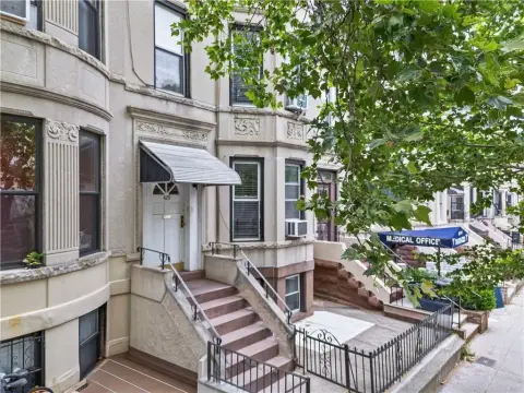 Attached Three-Family Limestone Home