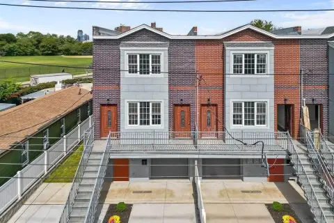 Three-Story Two-Family Brick Residence