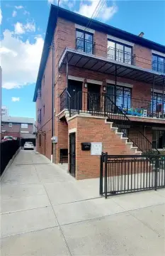 Like-New Three-Family Brick Home