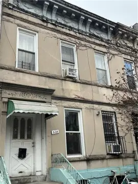 Two-Family Limestone Residence