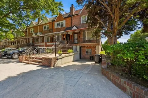 Brick Two-Family Corner Home