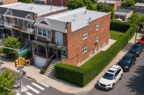 Brick Triplex With Private Driveway