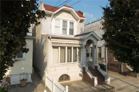 Detached Brick Duplex with Garage
