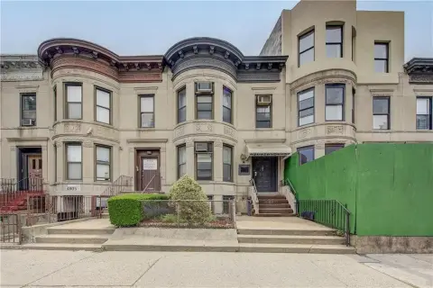 Two-Family Townhouse with Expansion Potential