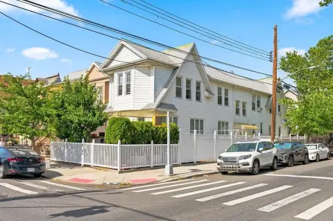 Three-Family Corner Home