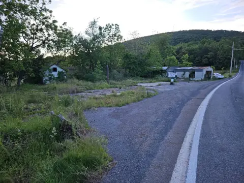 Vacant Land with Concrete Block Garage