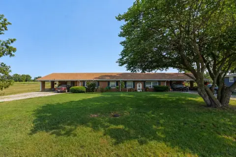 Brick Duplex with Pond