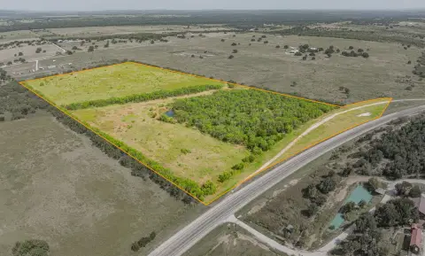 Unimproved Acreage with Pond