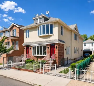 Detached Multi-Family Home with Driveway