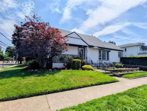 Two-Family Corner Home with Garage
