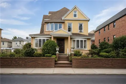 Three-Family Home with Private Driveway