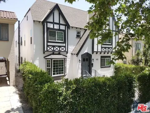 4-Unit Tudor Multifamily Building